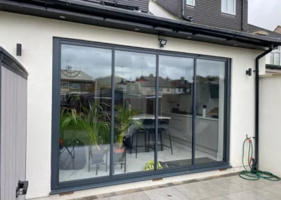 Ultra slim glass doors by a patio.