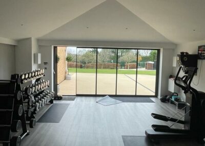 Ultra slim sliding doors by a patio. UK