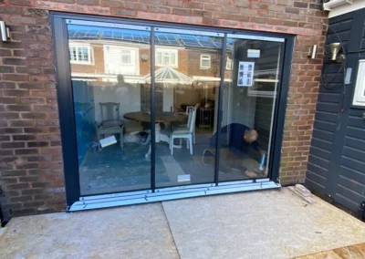 Glass external tilt and slide patio doors installed in a home in the UK