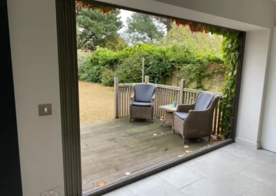 Modern glass bifold external patio doors in the UK looking out