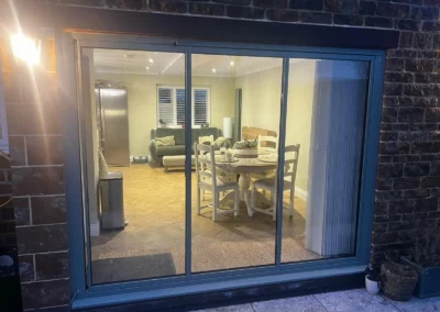Ultra slim bi folding patio doors newly installed for a UK customer. External view