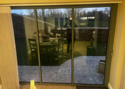Ultra slim bi folding patio doors newly installed for a UK customer. Internal view