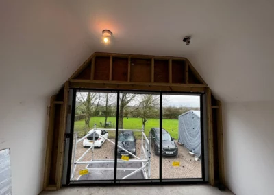 Ultra slim frame bi folding glass doors newly installed in the UK, internal view