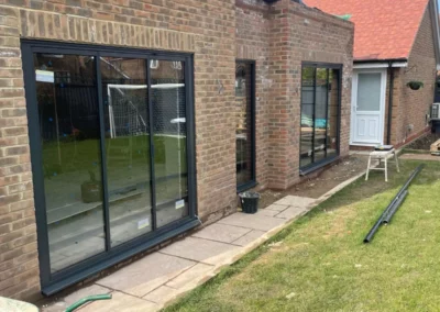 Ultra slim sliding glass doors overlooking a garden