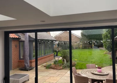 Ultra slim sliding doors looking out onto a garden