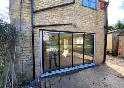 Ultra slim patio doors. Modern home, UK