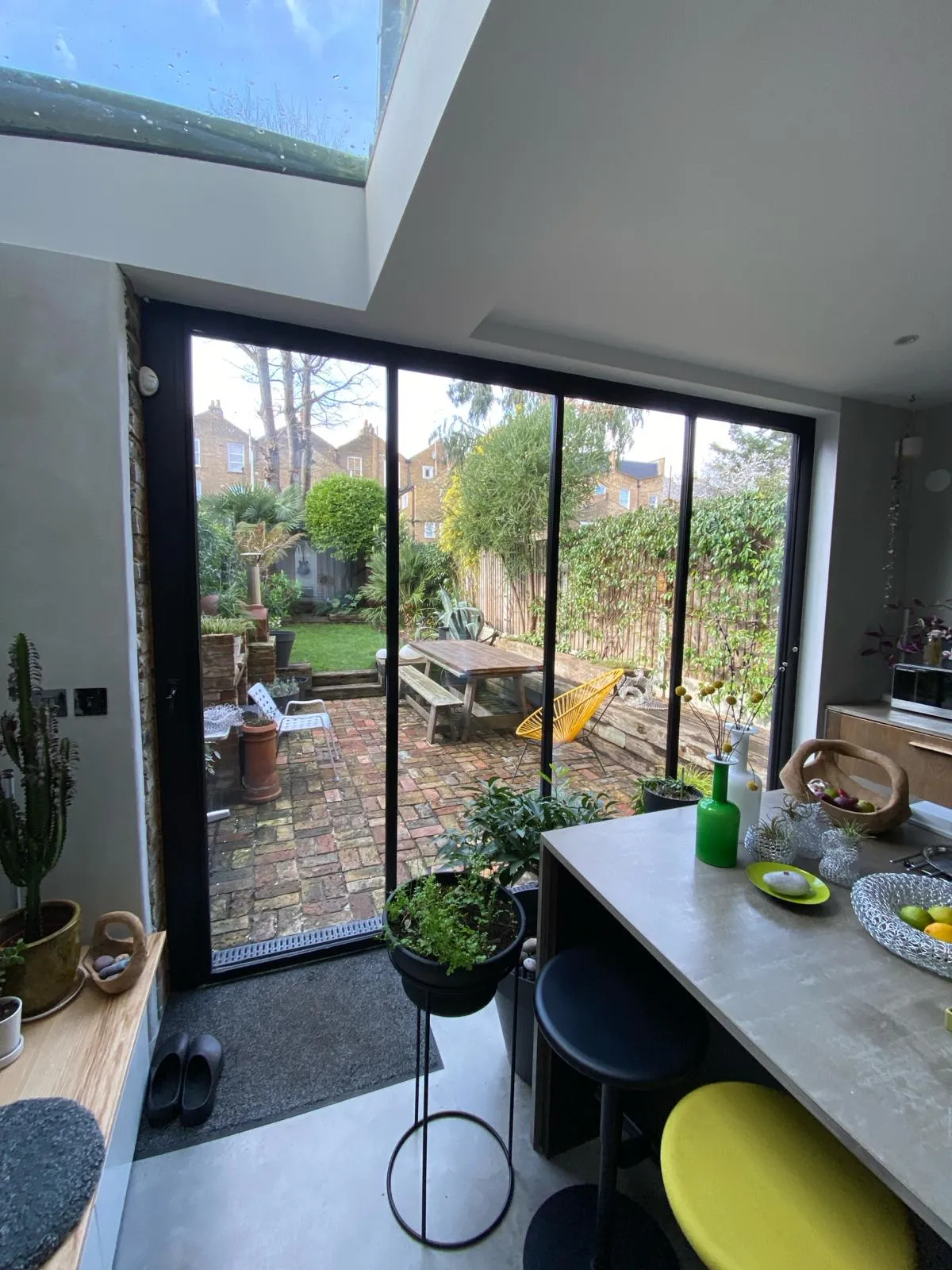 Garden views from dining area with ultra slim bifold doors