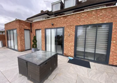 Ultra slim bi folding doors installed in a modern brick UK home