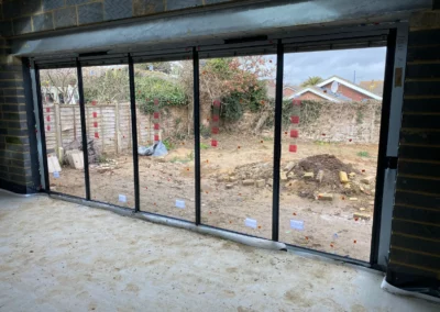 Frameless bi fold external glass doors