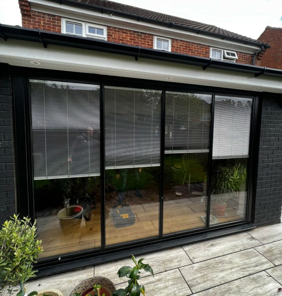 Glass panelled patio doors with blinds
