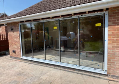 frameless glass patio doors closed