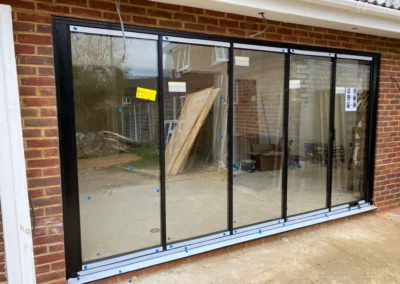 living room aluminium bifold doors