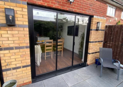 three panel slide and turn patio doors