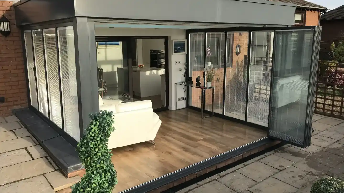 Glass patio doors fully open by Vision Glass Doors