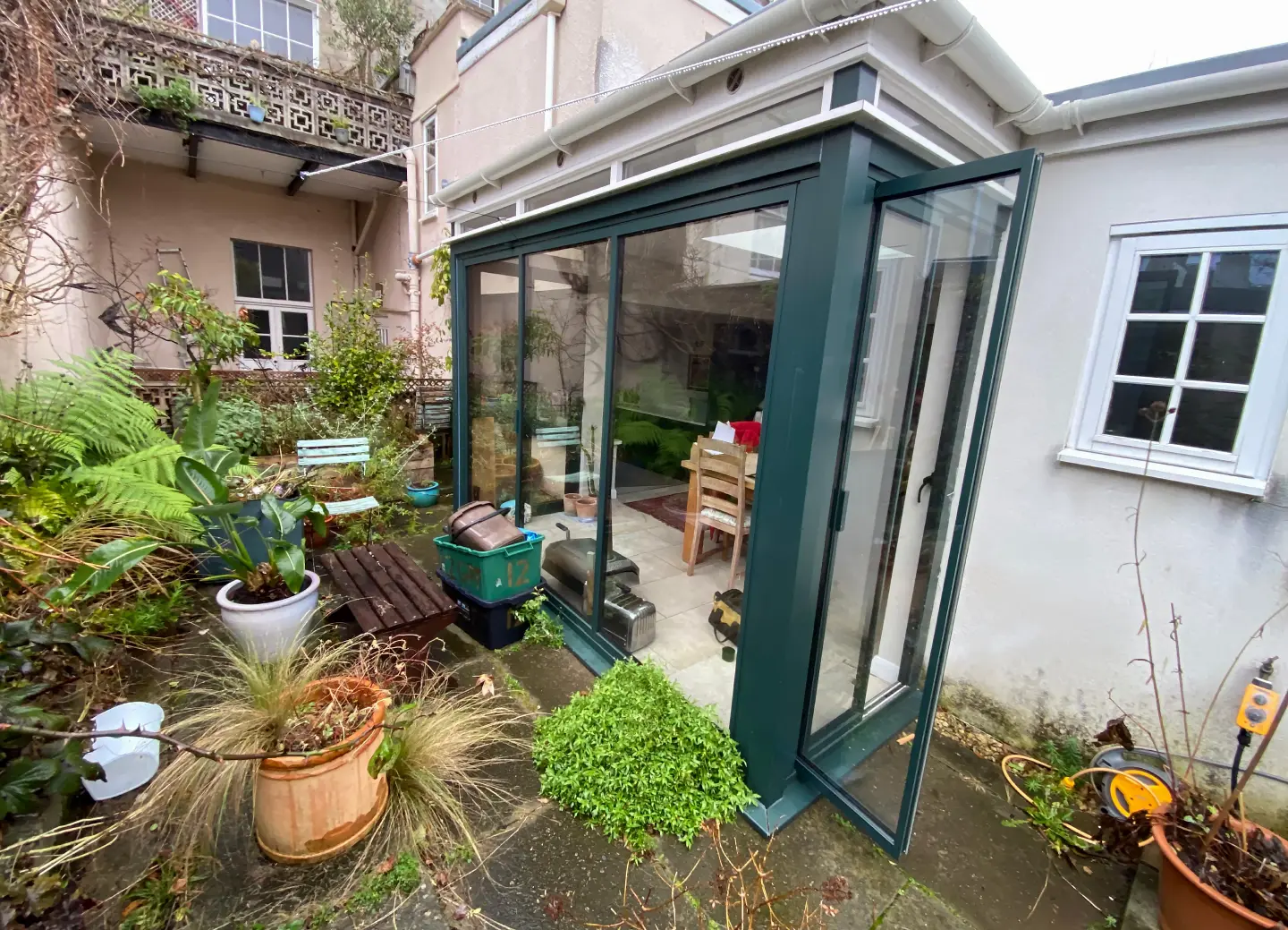dark green bifold doors