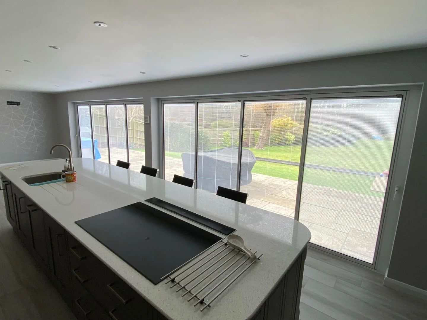 white bifold aluminium doors